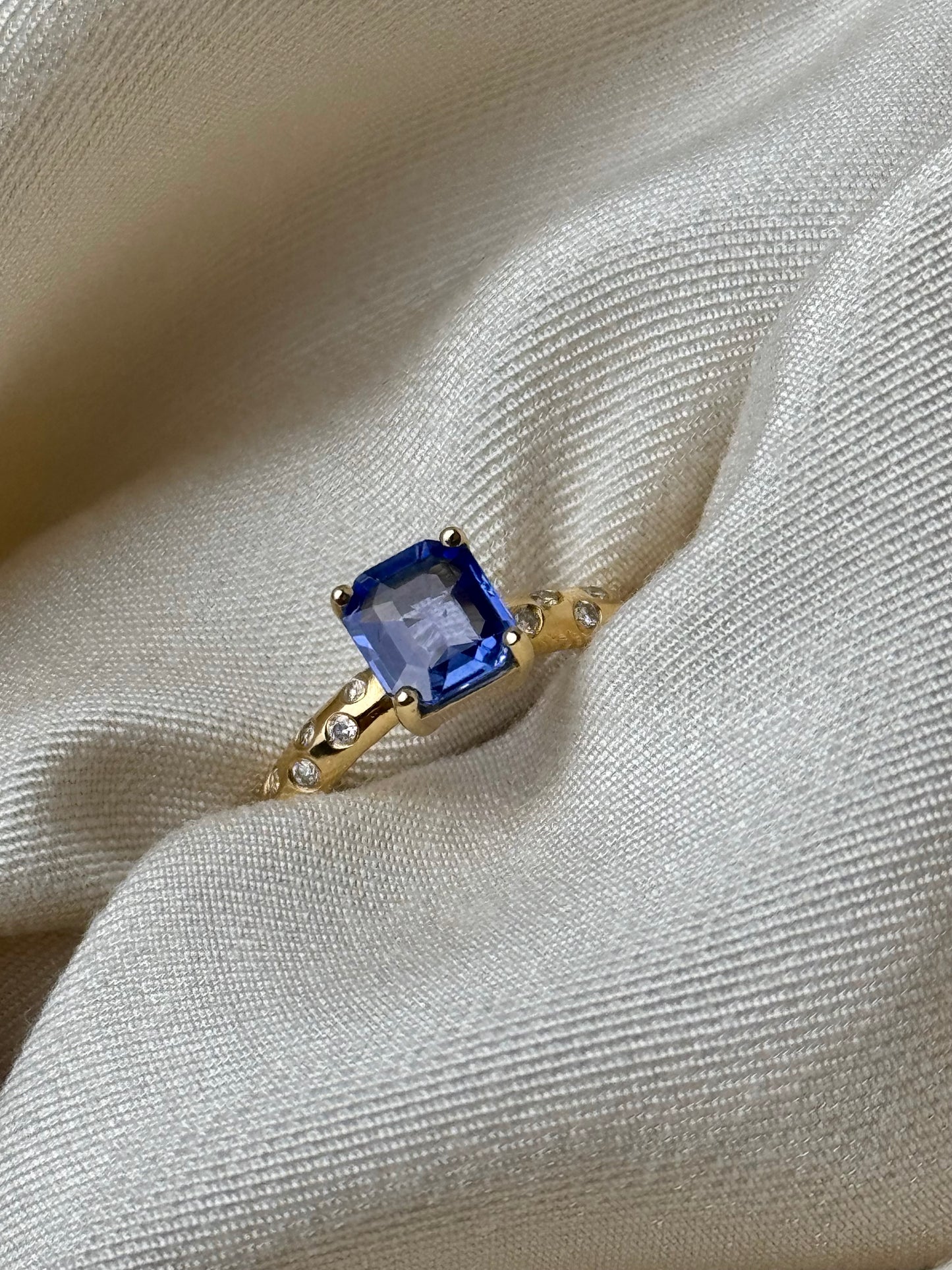 Sapphire Solitaire and Diamond Sprinkle Ring