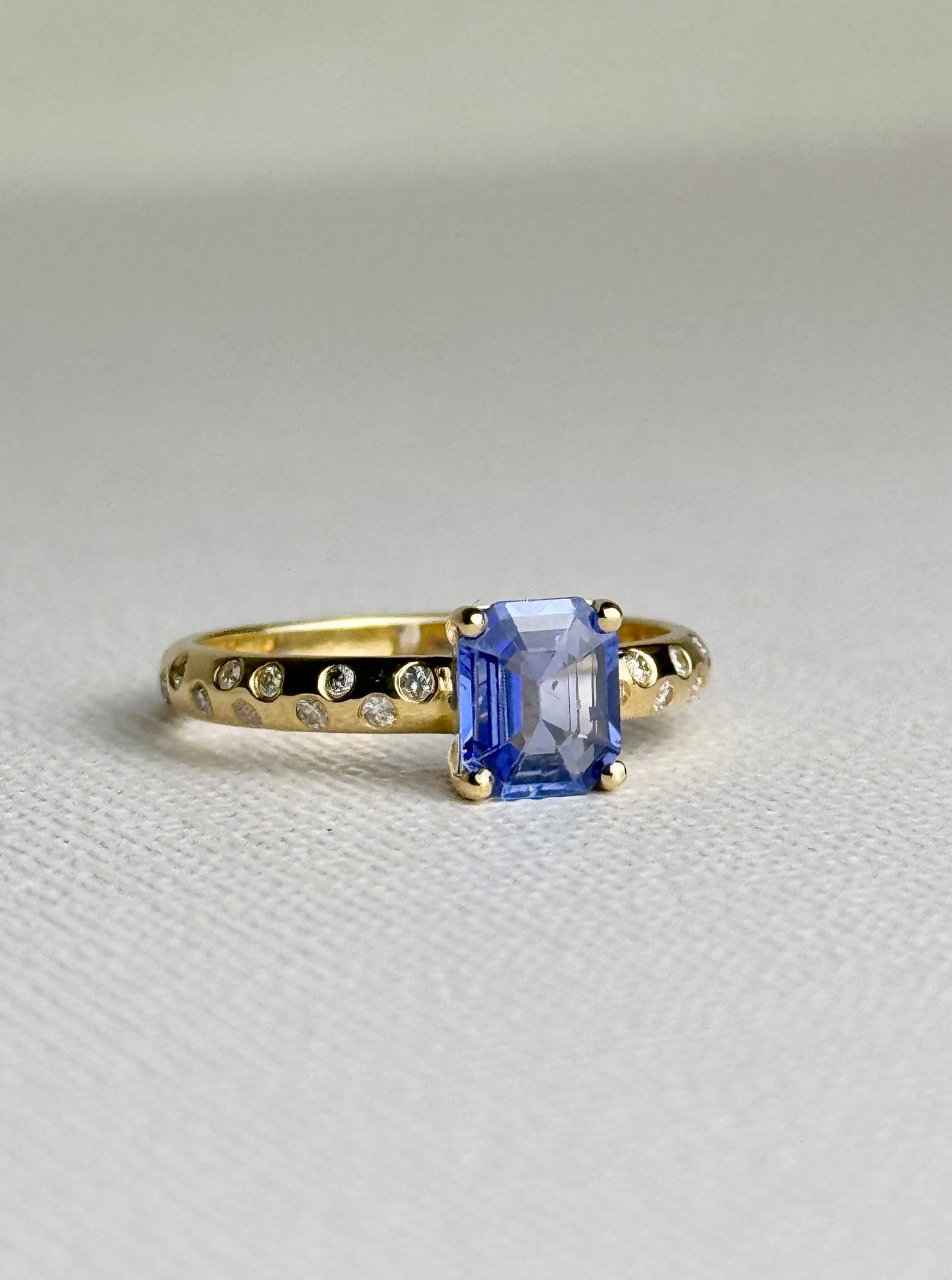 Sapphire Solitaire and Diamond Sprinkle Ring