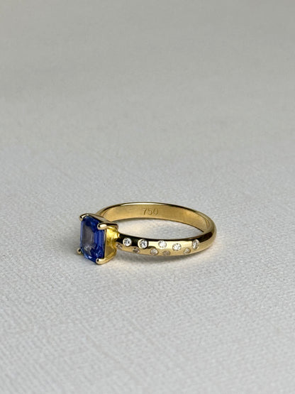 Sapphire Solitaire and Diamond Sprinkle Ring