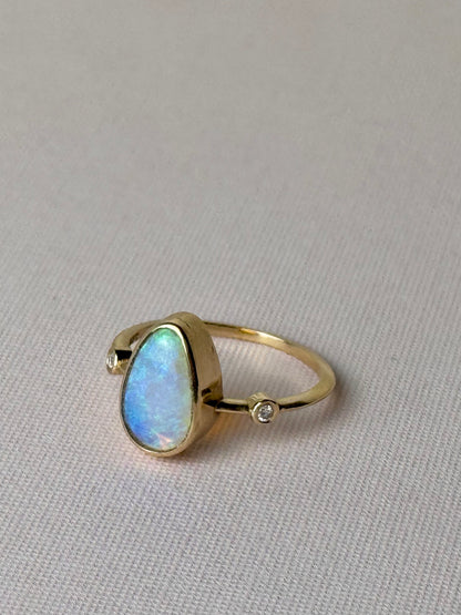 18k Solid gold crystal opal blue ring with diamonds, angle view