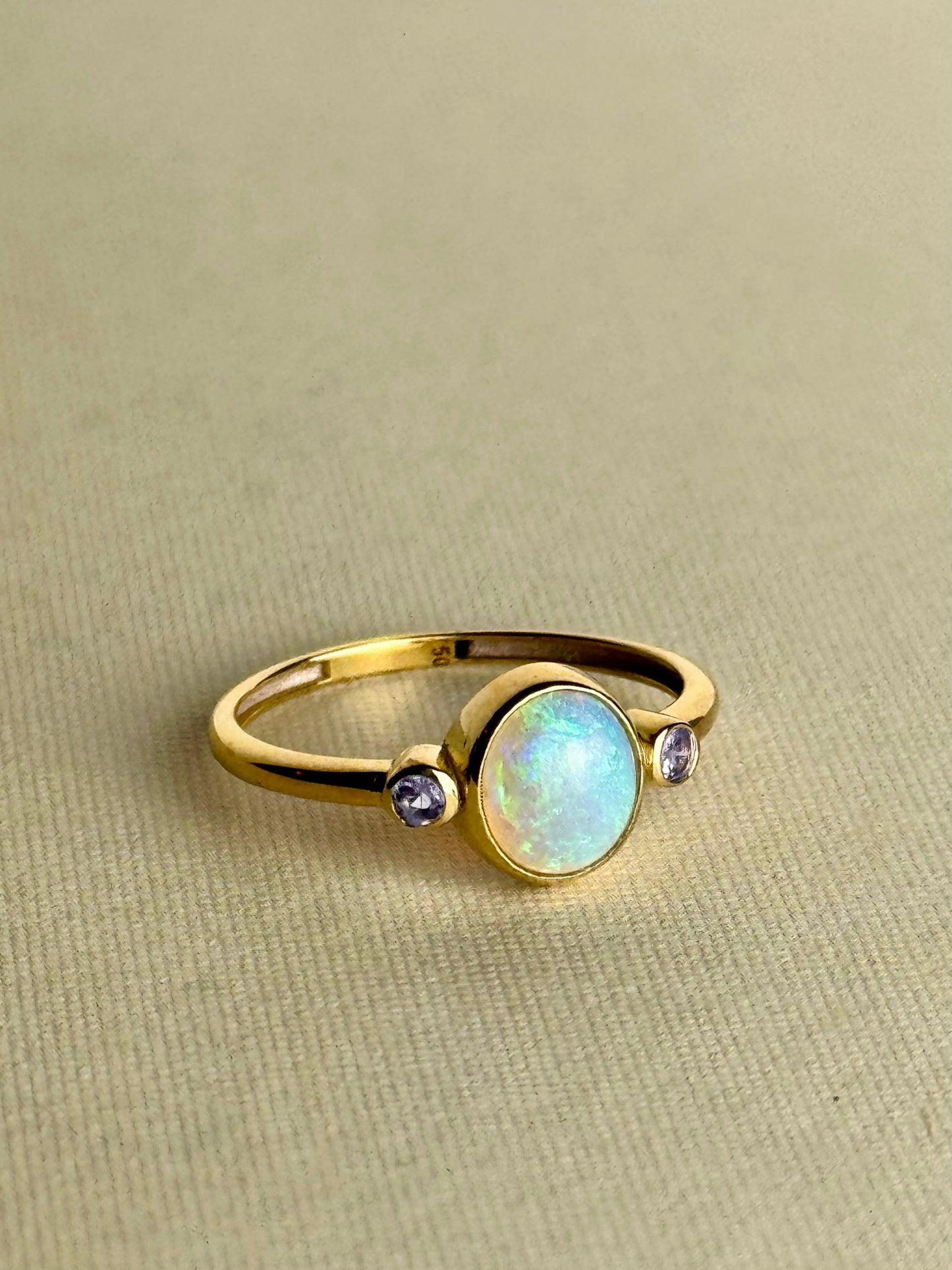 Crystal Opal and Tanzanite Ring